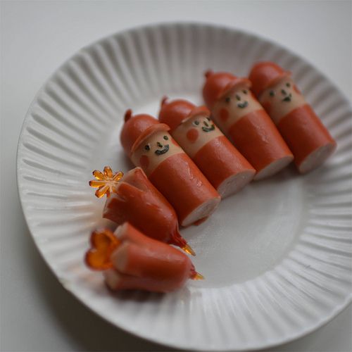 small pieces of food on a paper plate