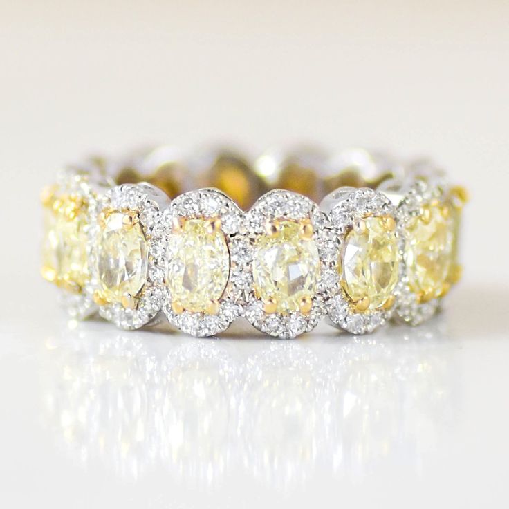 a fancy yellow and white diamond ring