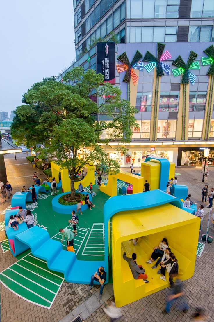 an outdoor play area in the middle of a city