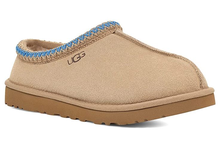 UGG Tasman - Men's Slippers : Sand/Santorini : Casual, yet rugged, classic slipper. The Tasman always fits tight at first especially if someone has a high instep or high volume foot. It does stretch out over time. If you are in between sizes, please size up or down based on the volume of your foot and height of your instep. The UGG Tasman is a casual, yet rugged, classic slipper. Sheepskin laminated to cow suede adds durability to uncompromised comfort. Sheepskin laminated to cow suede adds dura Bape Shoes, Ugg Tasman Slippers, Classic Slippers, Slippers Online, Ugg Tasman, Shoe Wishlist, Men's Slippers, Funky Shoes, Comfortable Slippers