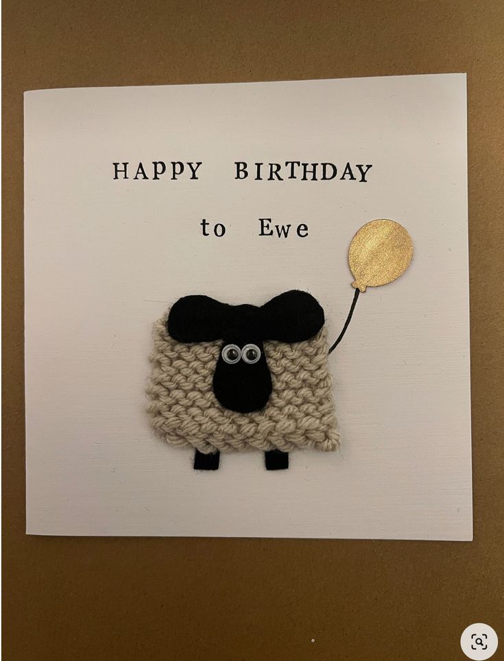 a card with a sheep holding a balloon saying happy birthday to eve