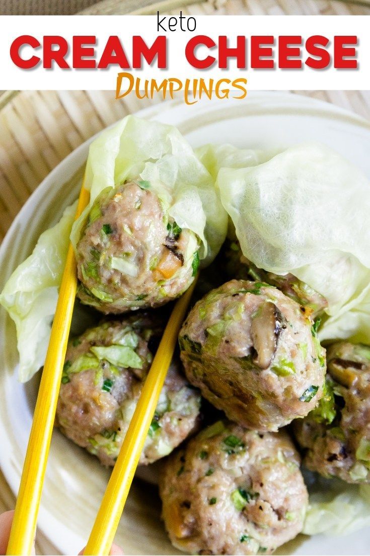 a white plate topped with meatballs and lettuce next to chopsticks