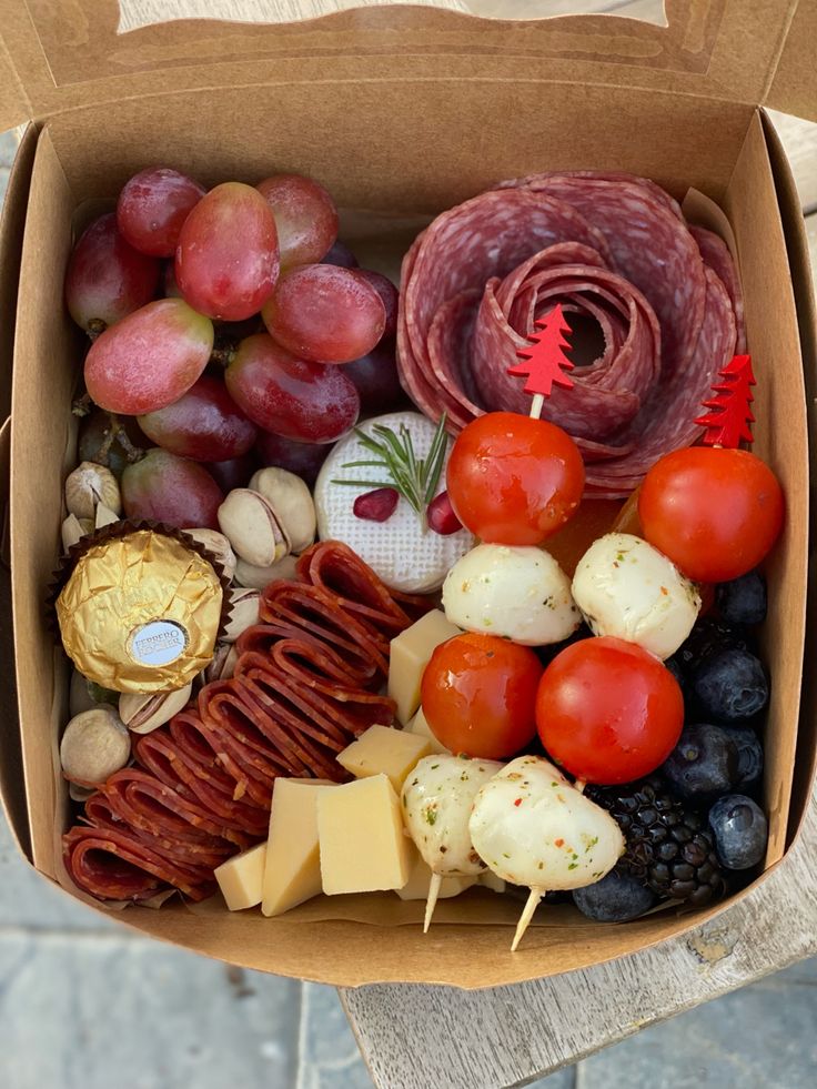 a cardboard box filled with different types of food