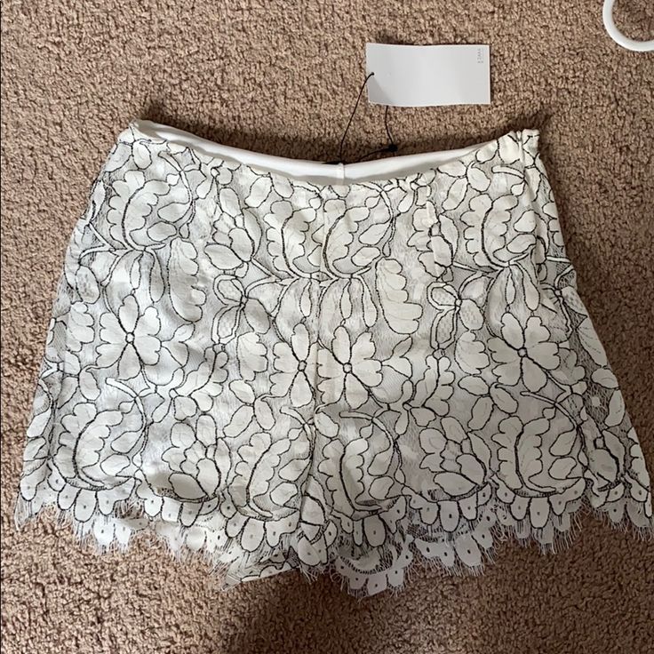 Never Worn, Tags Attached Lined, Side Zip Closure Size Medium Chic Lace Shorts For Spring, Elegant White Party Shorts, Chic Lace Shorts, Elegant Lace Shorts For Spring, White High-waisted Shorts For Night Out, Spring Lace Shorts, Lace Shorts For Spring, Chic Short Length Lace Shorts, Elegant Lace Bottoms For Vacation