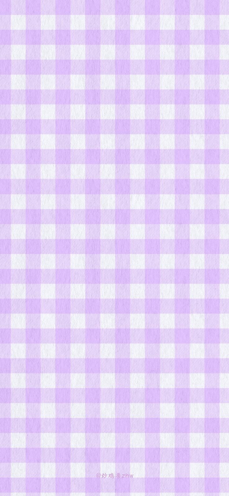 a pink and white checkered table cloth