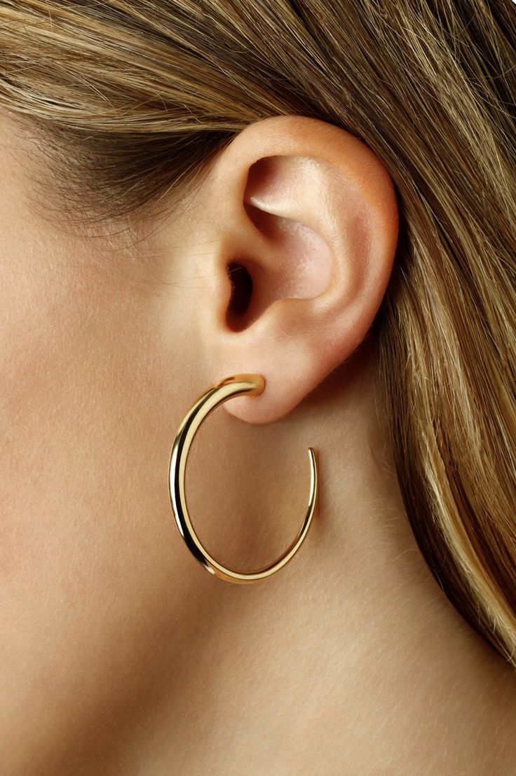 14k Modern Hoop Earrings Made with 14k Yellow Gold Size: Small Modern Small Hoop Earrings, Modern Small Hoop Earrings For Pierced Ears, Modern Single 14k Gold Hoop Earring, Modern Yellow Gold Hoop Jewelry, Sleek Round Everyday Jewelry, Sleek Everyday Round Jewelry, Sleek Hoop Jewelry Gift, Sleek Hoop Jewelry As A Gift, Modern Small Hoop Pierced Earrings