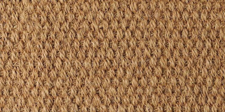 the texture of an area rug is brown