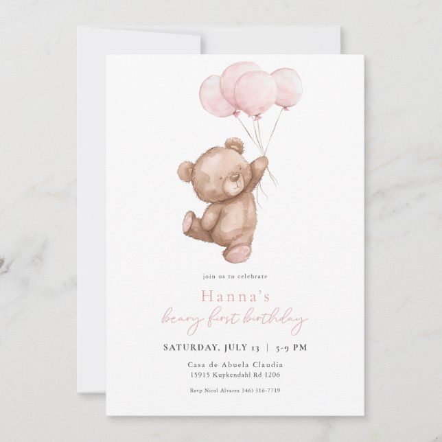 a pink teddy bear holding balloons on top of a white card with the words, baby's first birthday