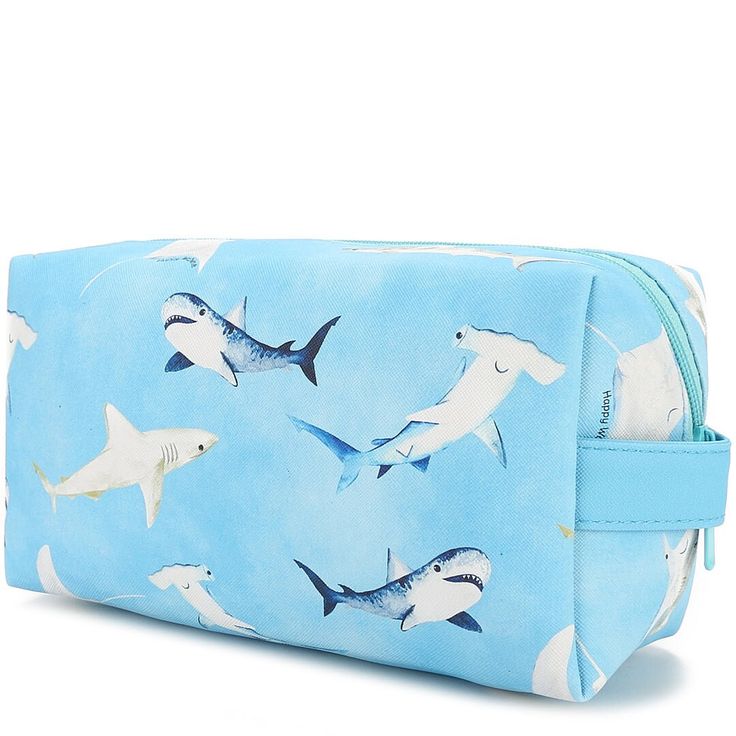 An adorable and square bag to hold all your essentials! Hold makeup, stationery, and more in this pouch and keep your bag organized! The Cosmetic Pouch Happy Sharks Blue is the perfect addition to your bag! Length: 8 inches Width: 4 inches Depth: 3 inches Weight: 0.4 lbs Material: Vegan Leather Rectangular Travel Pencil Case With Zipper, Rectangular Zipper Pouch Cosmetic Bag For Daily Use, Rectangular Zipper Pouch For Everyday Cosmetic Storage, Rectangular Zipper Pouch For Everyday Use, Blue Rectangular Cosmetic And Toiletry Storage As Gift, Daily Use Portable Rectangular Cosmetic Storage, Trendy Rectangular Stationery For Everyday Use, Blue Zipper Pouch For Daily Use, Cute Rectangular Cosmetic Bag For Travel