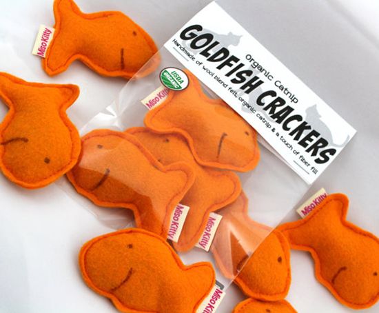 small orange catnip crackers in cellophane packaging