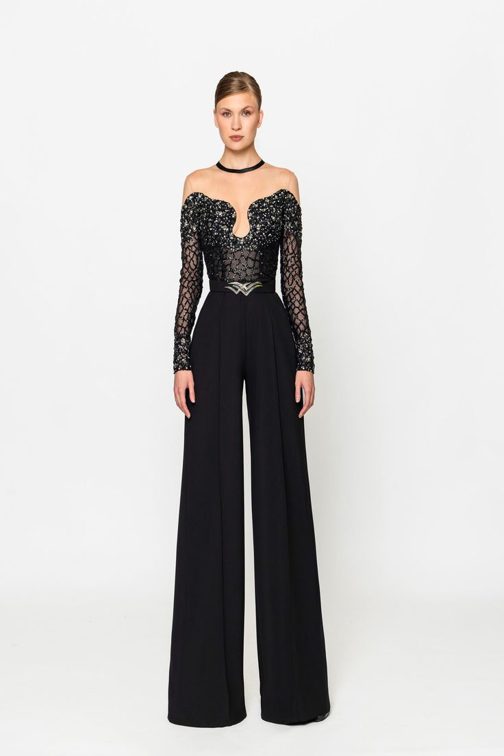 Elevate your style with the Naja Saade RTW23-09 black crepe jumpsuit. Featuring an intricately embroidered top and a removable belt, this jumpsuit exudes sophistication and elegance. Make a statement at any event with this timeless piece. Prom Romper, Diamond Suit, Glam Jumpsuit, Womens Skirt Suits, Crepe Jumpsuit, Suit Women, Fashion Art Illustration, Glam Dresses, Couture Dresses