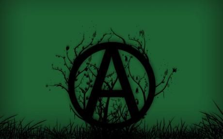 the letter a is surrounded by branches and grass in front of a green background with black letters