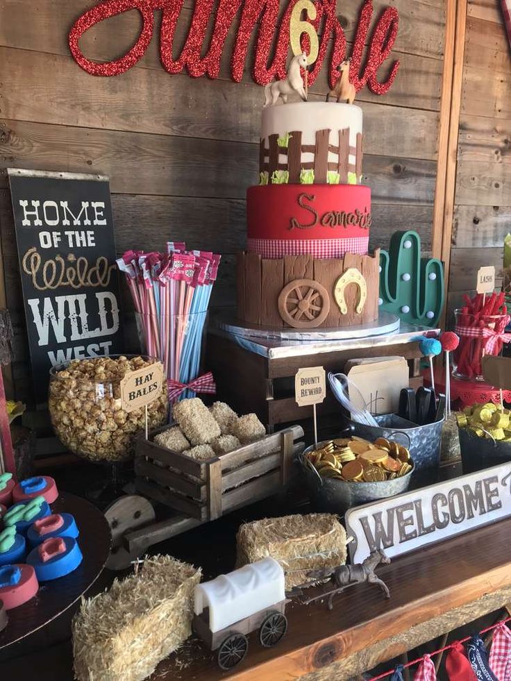 an assortment of desserts and sweets displayed on a table