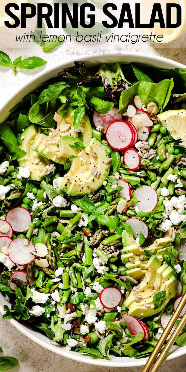 spring salad with lemon basil vinaie and radishes in a white bowl