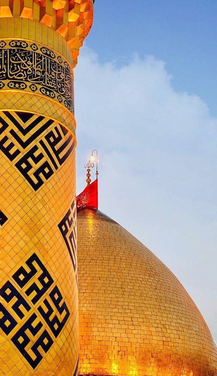 a large yellow building with intricate designs on it's sides