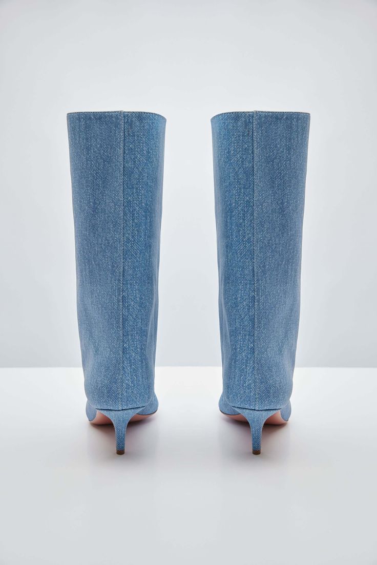 For Spring/Summer 2024, Amina Muaddi played with the idea of trompe l'œil by crafting a pair of thigh-high suede boots with a denim print. Spring Denim Knee-high Boots, Spring Knee-high Denim Boots, Denim Knee-high Boots For Spring, Denim Summer Boots, Blue Fitted Knee-high Boots For Spring, Fitted Denim Summer Boots, Fitted Blue Knee-high Boots For Spring, Fitted Denim Boots For Summer, Chic Denim Blue Boots For Spring