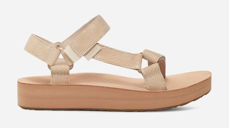 Channeling a subtle wave pattern via laser-etched leather straps, our new Midform Universal Grooveline cues up the perfect beach-chic look. Elevated by the same 1.75" platform that catapulted the Midform Universal into icon status, this leather flatform sandal has become a fast favorite for festival season. | Universal Strapping Stytem, Metal hardware elevates the sandal with a touch of sophistication, Premium leather upper with a custom laser-etched design. Easy hook-and-loop closure comes on a Teva Midform, Maple Sugar, Teva Sandals, Leather Industry, Women's Shoes Accessories, Flatform Sandals, Beach Chic, Backpacking Packing, Sport Sandals