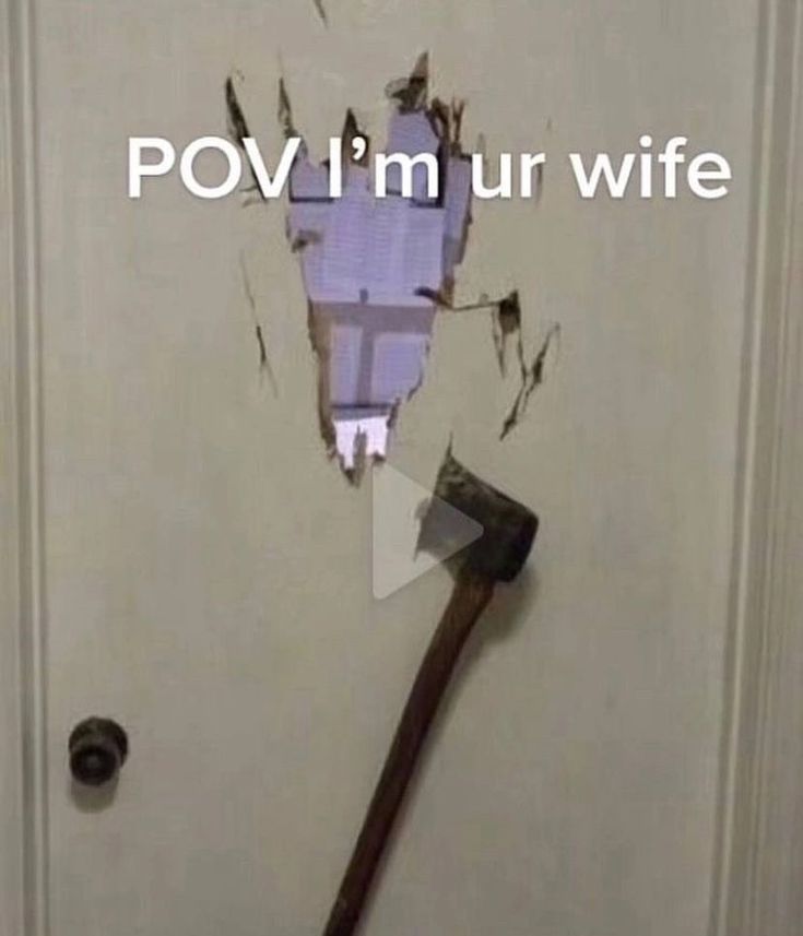 a hammer stuck in the middle of a door that says pov i'm ur wife