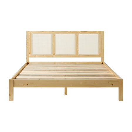 a wooden bed frame with white headboard and foot board on the bottom part of it