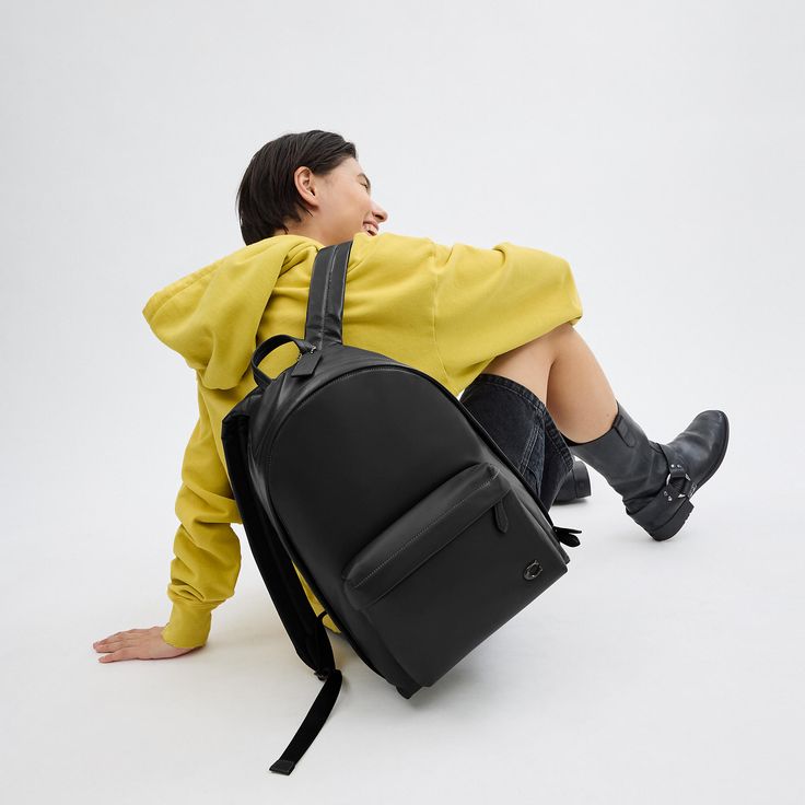 Our Hall is made for doing it all (just like you). This versatile backpack has space for a 16” laptop interior organization pockets and an exterior pocket for easy access to essentials. Featuring our Signature hardware and adjustable shoulder straps it’s crafted of our pliable lightest weight leather with a smooth soft finish. (Lighten up.) | Coach Hall Backpack - Black Coach Travel Backpack With Zipper Pocket, Coach Leather Backpack With Zipper Pocket, Coach Standard Backpack For Travel, Coach Leather Backpack For Daily Use, Casual Laptop Backpack With Removable Pouch, Casual Coach Leather Backpack For Daily Use, Casual Coach Leather Backpack, Modern Coach Backpack With Zipper Closure, Coach Standard Backpack For Everyday Use