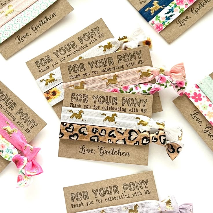 several different types of headbands are laid out on top of each other, with the words for your pony printed on them