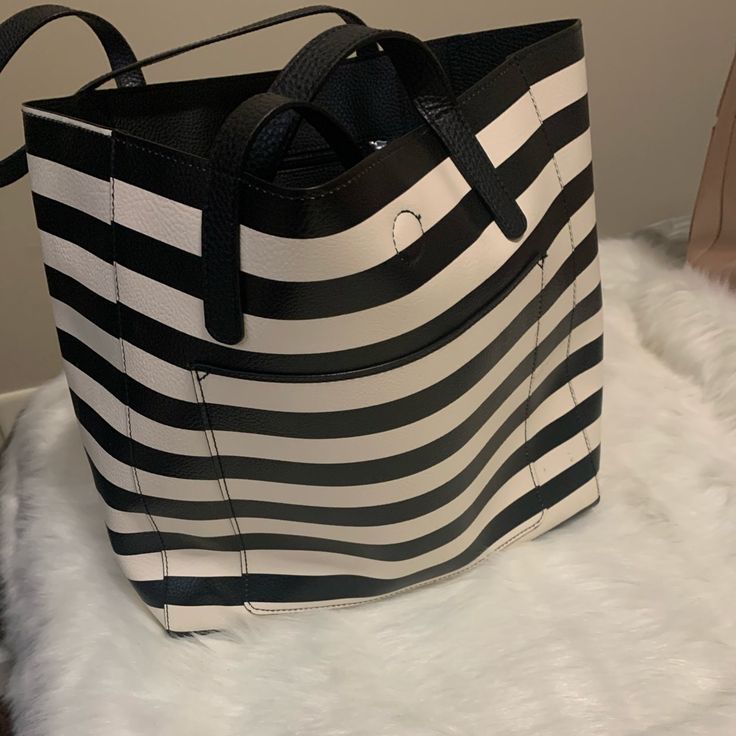 Large Stripe Tote Bag (Reversible Black Side) Reversible Bucket Bag, Chic Reversible Bags For Daily Use, Casual White Reversible Shoulder Bag, White Reversible Shopping Bags, White Reversible Bags For Shopping, Trendy Reversible Shopping Bags, Black Reversible Bag For Daily Use, Everyday Reversible Black Bag, Chic Reversible Shoulder Bag For Shopping