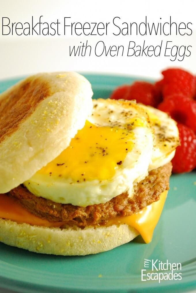 breakfast freeze sandwiches with oven - baked eggs on english muffins and strawberries