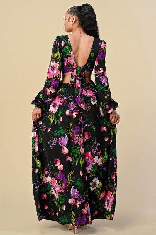 Floral print on a black background Deep V neckline, full length maxi dress, side cutouts Material: 100% Polyester V-neck Cutout Maxi Dress For Brunch, Floral Print V-neck Maxi Dress For Night Out, Spring Printed Maxi Dress, Chic Maxi Dress With Cutout Back, Spring Beach Maxi Dress With Cutout Back, Spring V-neck Maxi Dress With Cutout, Spring Backless Maxi Dress For Date Night, Spring Party Maxi Dress With Cutout Back, Spring Maxi Dress For Date Night