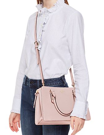 7.8"h x 11.5"w x 4.5"dstrap length: 22"pebbled leathertwo way spade jacquard liningsatchel with zipper closurefront and back slide pockets with snap closuresfoil embossed logointerior zipper and dual slide pocketsstyle # wkru4002Color: Tutu Pink Classic Leather Satchel For Spring, Classic Travel Satchel For Spring, Classic Bags With Zipper Closure For Spring, Mulberry Street, Warm Beige, Kate Spade New York, Satchel, Kate Spade, New York