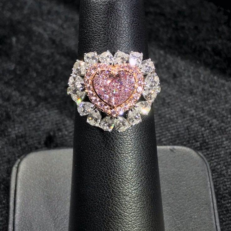 Approximately 1.00 Carat Heart Shape GIA Certified Faint Pink 3.00 Carat Total VVS1 Clarity Set in 18k White Gold Fancy Pink Diamond Halo 16 White Pear Shapes Order will be ready to ship in 3-4 weeks. Luxury Rose Cut Diamond Heart Ring For Anniversary, Fancy Pink Diamond Ring, Heart Diamond Ring, Pear Shapes, Heart Shaped Diamond Ring, Pink Diamond Engagement Ring, Pink Diamond Ring, Diamond Heart Ring, Historic Houses