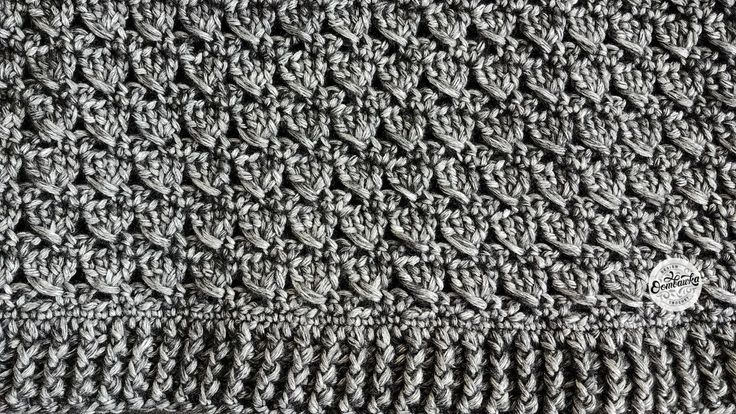 a close up view of a knitted blanket