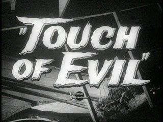 a black and white photo with the words touch of evil