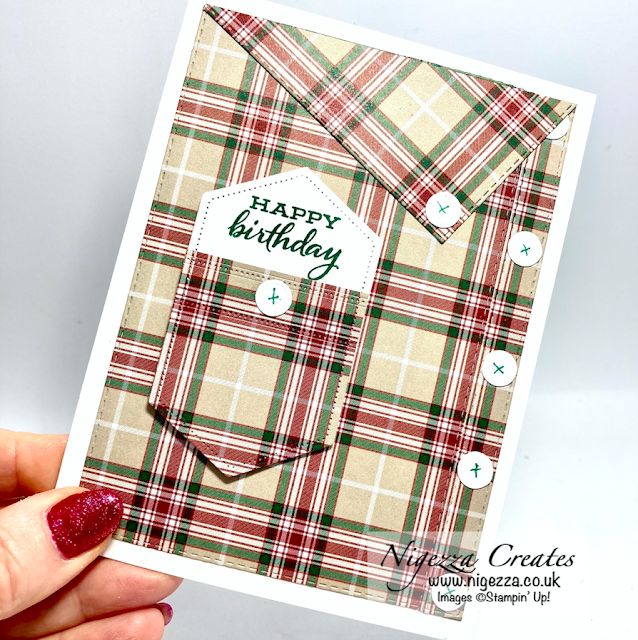 a hand holding up a card that says happy birthday in green, red and white plaid