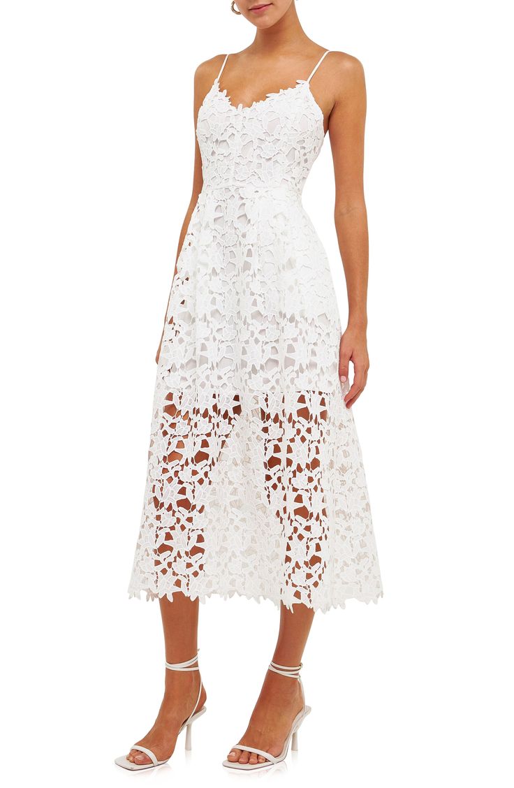 Floral lace embroidery beautifully covers the fit-and-flare silhouette of a sleeveless midi dress with scalloped trim and hidden pockets at the sides. 100% polyester Hand wash, dry flat Imported Summer Midi Dress With Lace Bodice And Spaghetti Straps, Spring Lace Dress With Scalloped Lace And Spaghetti Straps, Sleeveless Delicate Lace Midi Dress For Party, Sleeveless Midi Dress With Delicate Lace For Party, Sleeveless Midi Dress With Delicate Lace For Summer, Summer Midi Dress With Scalloped Edges, White Midi Dress With Cutwork Hem, Sleeveless Lace Dress With Scalloped Edges For Summer, A-line Midi Dress With Scalloped Lace