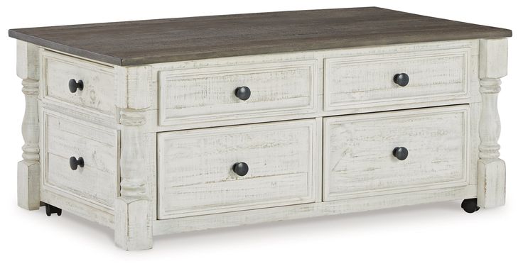 a white dresser with drawers and wooden top