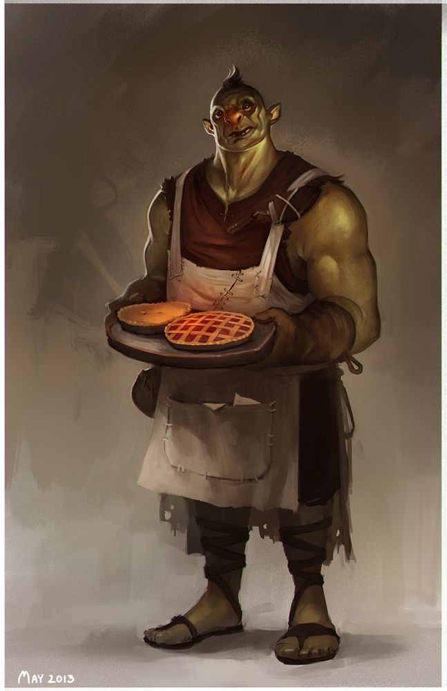 a man in an apron holding a plate with waffles on it's side