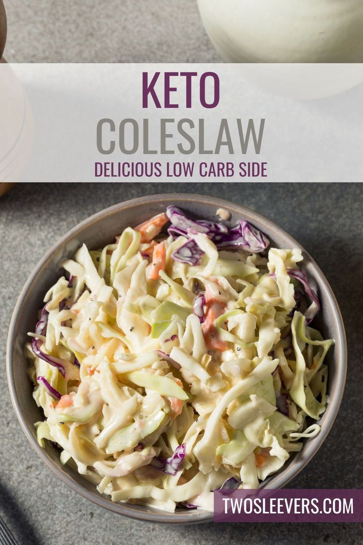 a bowl filled with coleslaw sitting on top of a table