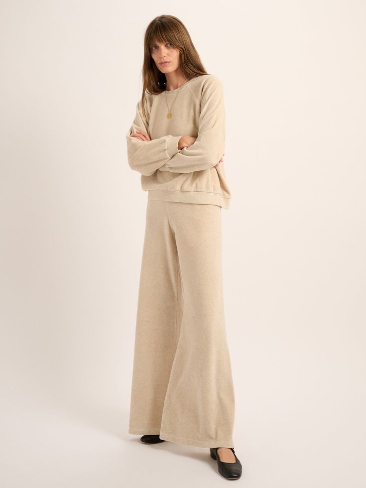 Perfectly proportioned, the relaxed fit is finished with a wide leg flourish, a high waist and exaggerated ankle detailing. Crafted in velour. Beige Full Length Wide Leg Pants For Loungewear, High-waisted Beige Wide Leg Pants For Loungewear, Beige Wide Leg Pants For Loungewear, Suzie Kondi, Gypset Style, Flare Pants, Oatmeal, High Waist, Wide Leg