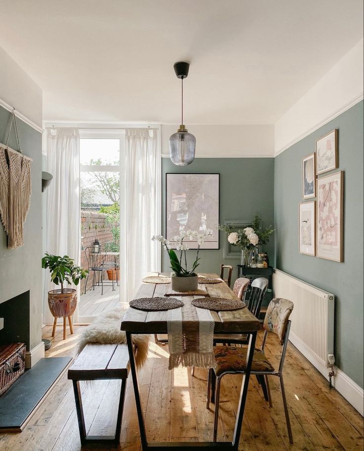 the dining room is clean and ready for us to eat dinner on it's own table