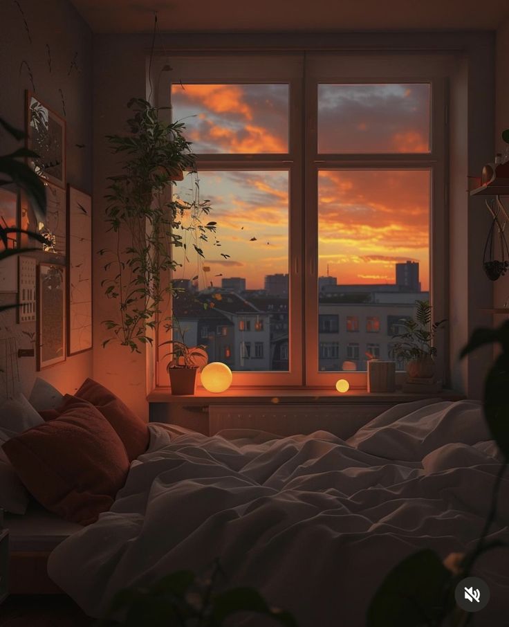 an image of a bedroom setting with the sun going down in the sky and some plants on the window sill