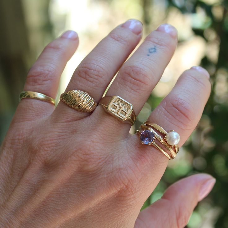 This 14k yellow gold ring features diamond cut etching and details throughout the face of the ring with a tapered shank, it's a great simple statement! ⊹ 14K Yellow Gold⊹ Stamp reads 14K⊹ Excellent vintage, pre-owned condition⊹ Ring Size: 6 Pre Owned Rings, Yellow Gold Engraved Ring Stamped 14k For Everyday, Everyday Yellow Gold Heirloom Engraved Ring, Heirloom Engraved Yellow Gold Ring For Everyday, Everyday Heirloom Yellow Gold Engraved Ring, Hammered 14k Yellow Gold Signet Ring, Hammered Yellow Gold 14k Signet Ring, Anniversary Hammered Yellow Gold Signet Ring, Classic Gold Engraved Birthstone Ring