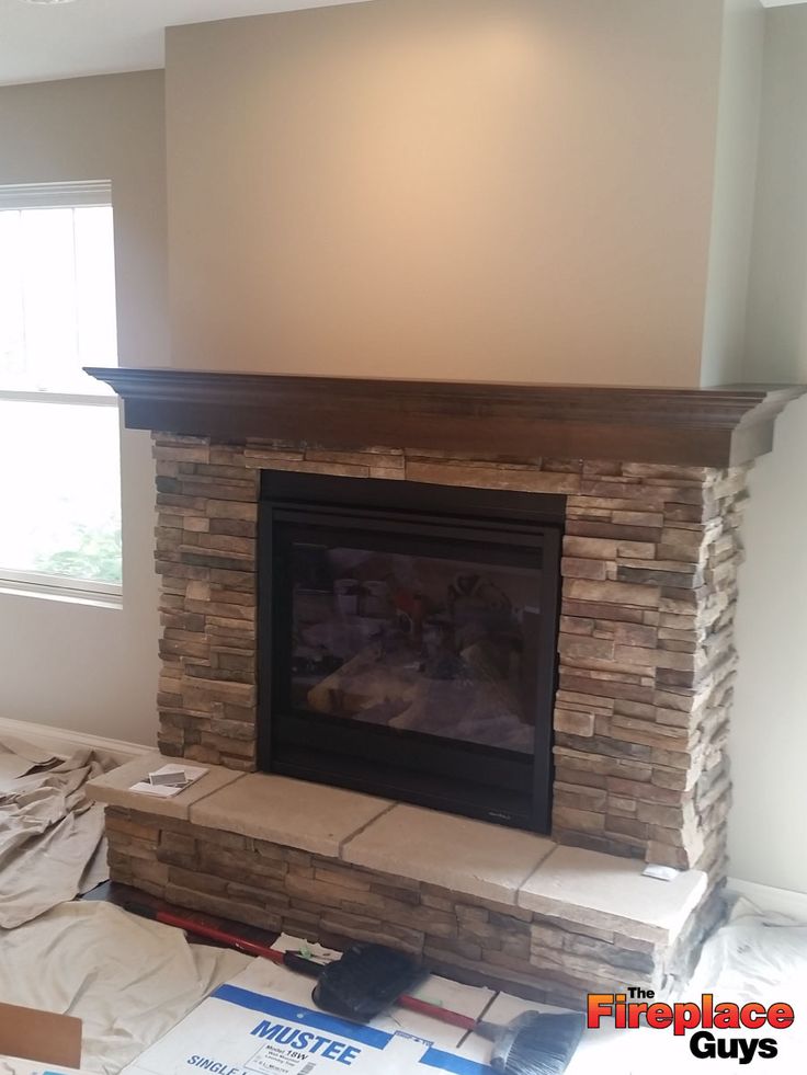 the fireplace is being installed in the living room