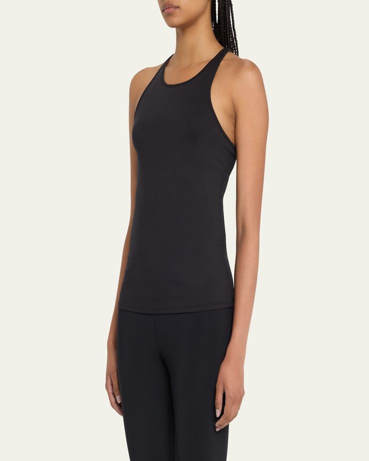 Alo Yoga "Select" active tank in solid stretch knit. Halter neckline. Sleeveless. Racerback. Fitted. Pullover style. Polyester/spandex. Imported. Racerback Tank Top With Built-in Bra And 4-way Stretch, Athleisure Tank Top With Built-in Bra And Medium Support, Versatile Tank Top With Built-in Bra And 4-way Stretch, Sporty Stretch Tank Top With Built-in Bra, Alo Yoga Gym Activewear, Athleisure Top With Built-in Bra And Halter Neck, Sports Tops With Built-in Bra And Minimal Stretch, Athleisure Tank Top With Built-in Bra, Alo Yoga Elastane Activewear For Yoga