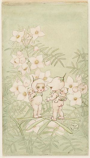 two small children standing in front of flowers