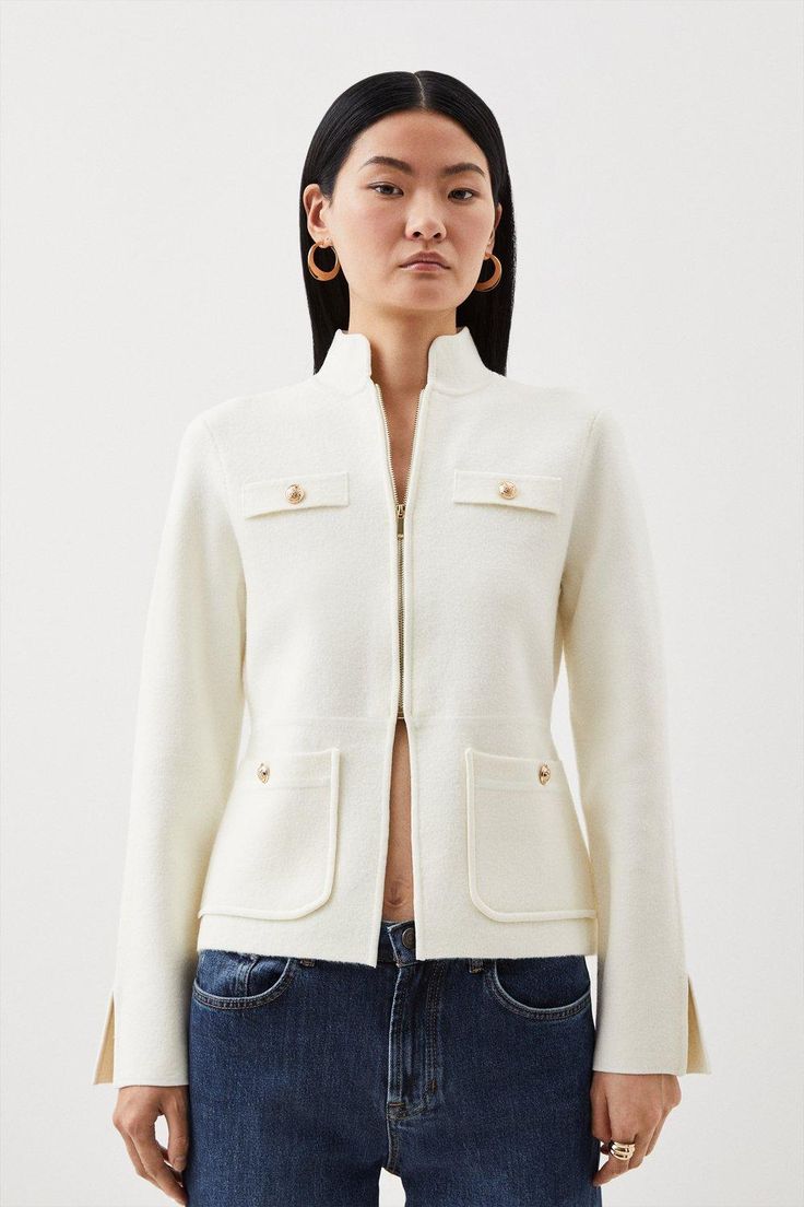 Elevate Your Jacket Wardrobe With This Sporty-Inspired Piece. Crafted From Sumptuous Compact Wool That Sculpts The Silhouette, While A Funnel Neck Cascades To A Front Zip Cut By A Front Split For A Contemporary Touch. Finished With Polished Golden Button Pockets And Split Long Sleeves. Layer Over Essential Knit Tops And Pair With Straight Leg Jeans For A Casual Yet Sophisticated Outfit.Funnel Neckpocket Detailfront Zipcut Out Detail Funnel Neck Wool Outerwear For Work, Wool Funnel Neck Outerwear For Work, Wool Outerwear With Funnel Neck For Work, Modern Funnel Neck Outerwear For Fall, Chic Funnel Neck Outerwear For Work, Fall Funnel Neck Outerwear With Zipper Closure, Classic Fitted Outerwear With Funnel Neck, Classic Fitted Funnel Neck Outerwear, Fall Workwear Cardigan With Zipper Closure