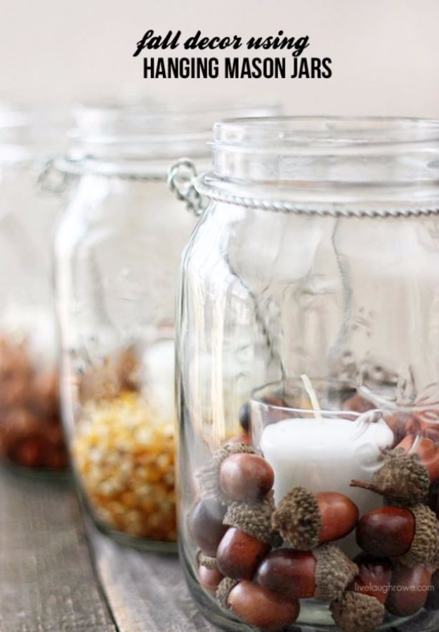 three mason jars filled with different types of nuts and other things to put in them