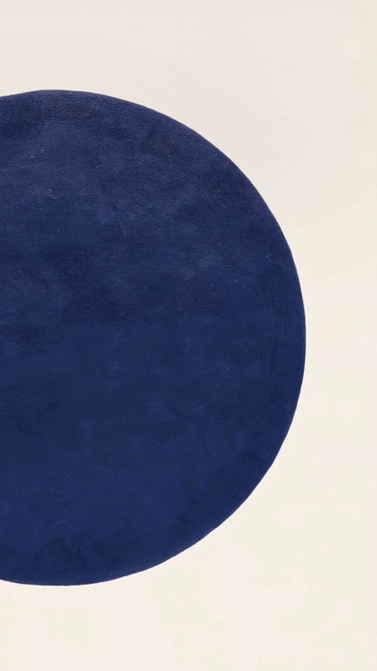 a blue circle on a white background