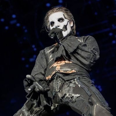 a man in black and white makeup on stage