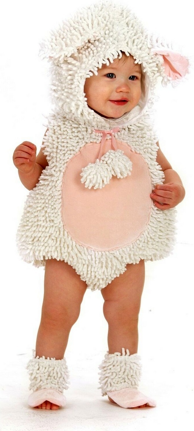 a baby dressed in a sheep costume