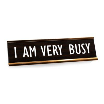 a black and white sign that says i am very busy